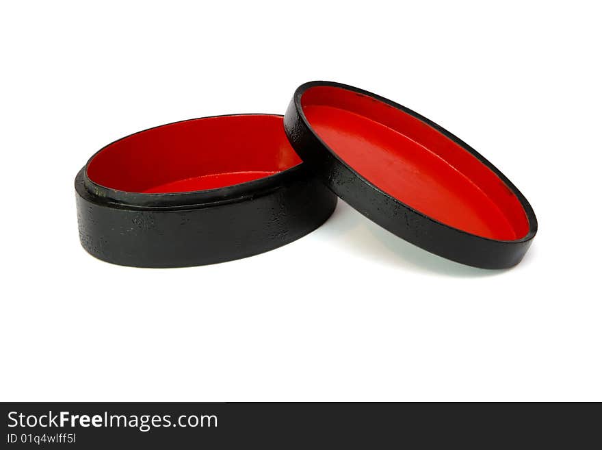 Oval black casket with red lining