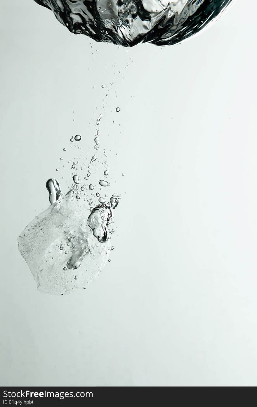 Ice splashing underwater with bubbles. Ice splashing underwater with bubbles