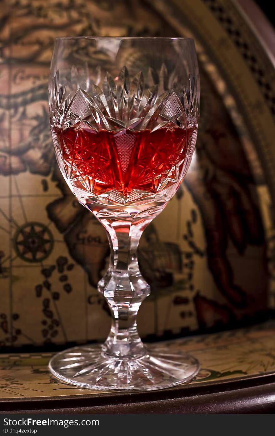 Crystal glass full of red tasty wine. Crystal glass full of red tasty wine