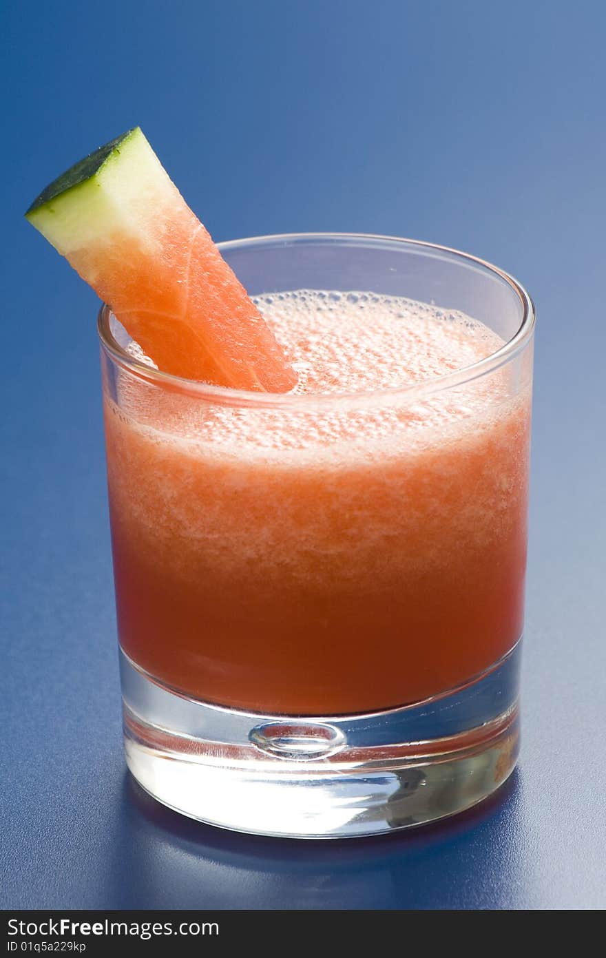 Refreshing cold watermelon juice isolated over white