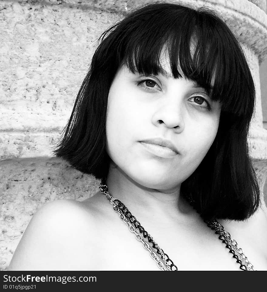 Black and white photograph of a young Hispanic woman. Black and white photograph of a young Hispanic woman