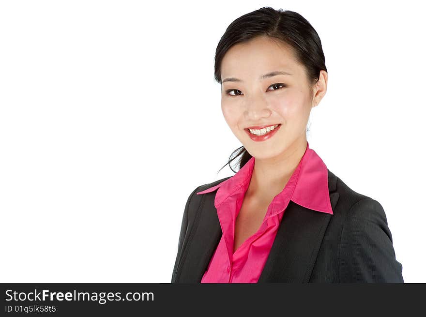 An attractive businesswoman posing in a studio