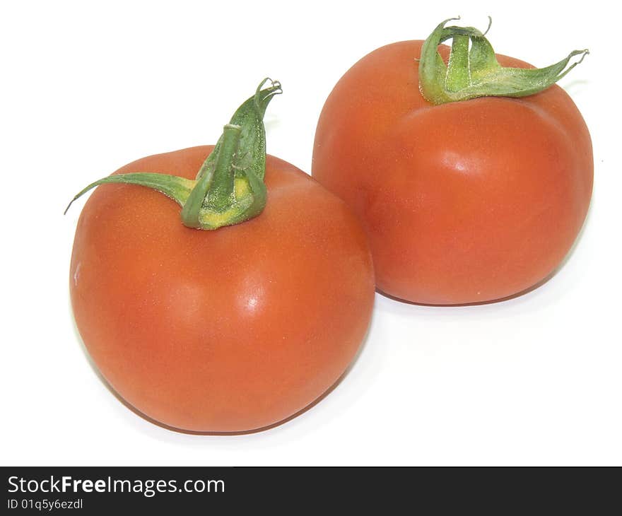 Fresh tomatoes with leaves, isolated