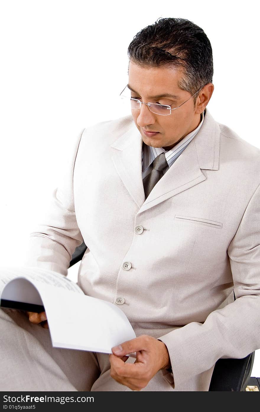 Top view of businessman looking in to file with white background