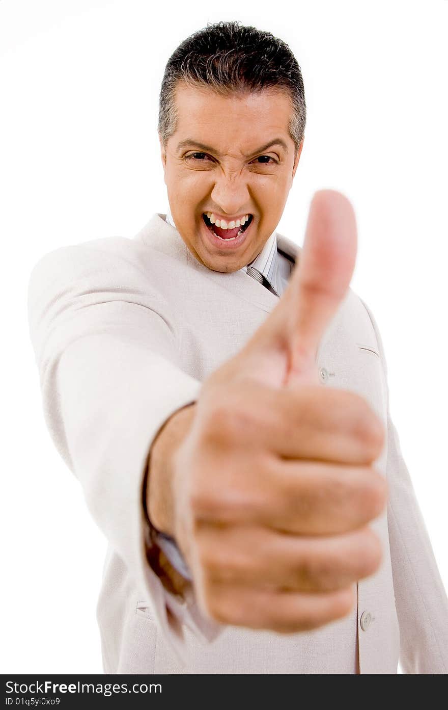 Side view of successful businessman showing thumb up with white background