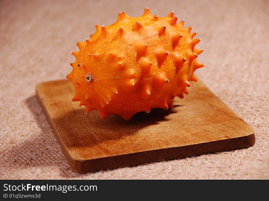 Kiwano or African horned melon . Also known as hedged gourd, African Horned Cucumber, English tomato. Kiwano or African horned melon . Also known as hedged gourd, African Horned Cucumber, English tomato