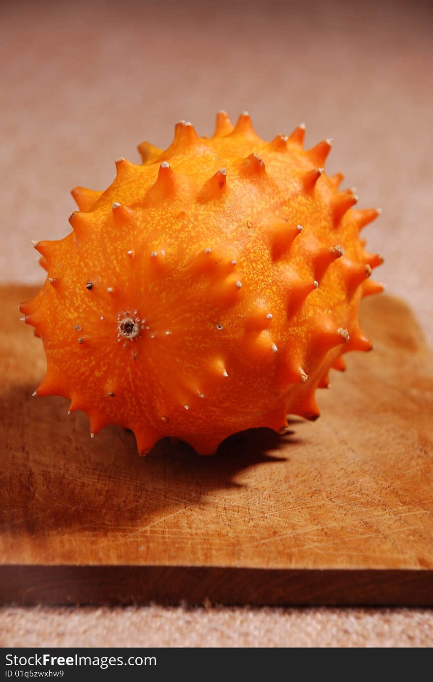 Kiwano or African horned melon . Also known as hedged gourd, African Horned Cucumber, English tomato. Kiwano or African horned melon . Also known as hedged gourd, African Horned Cucumber, English tomato