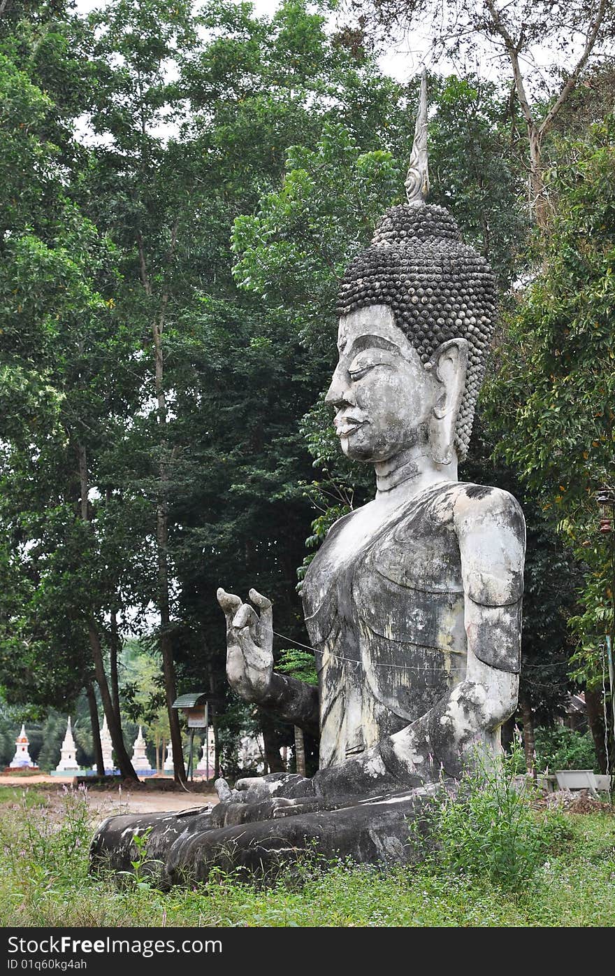 Old Buddha statues. At a temple in Thailand. Old Buddha statues. At a temple in Thailand.