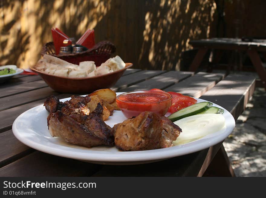 Served meat grill on the plate