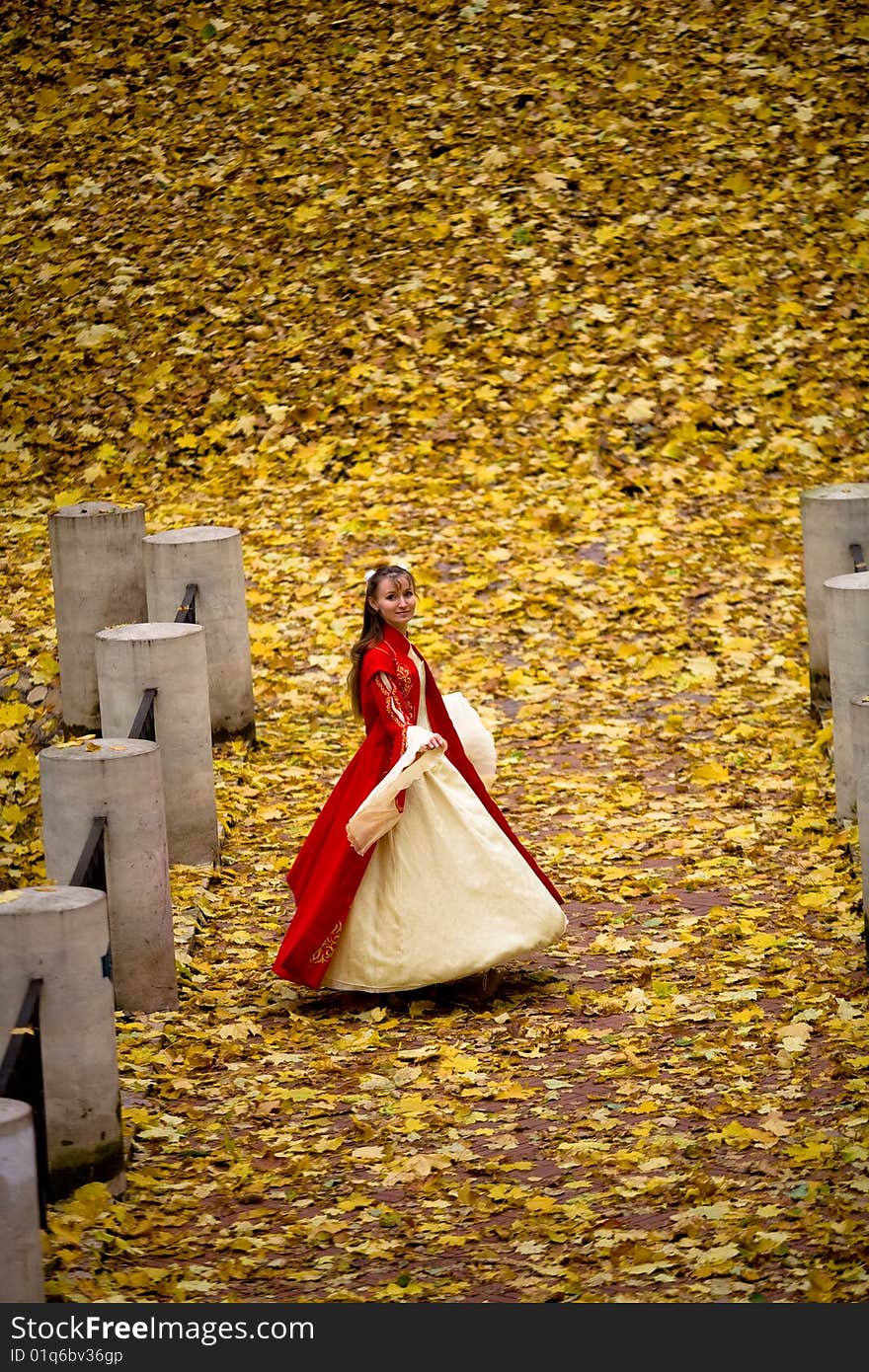 Lady In Autumn Forest