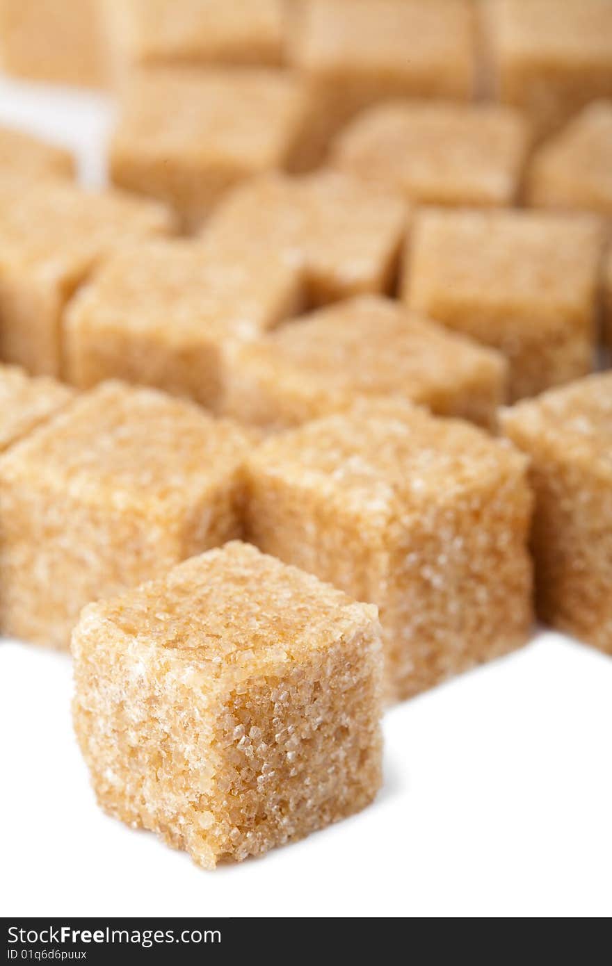 Cane sugar cubes isolated