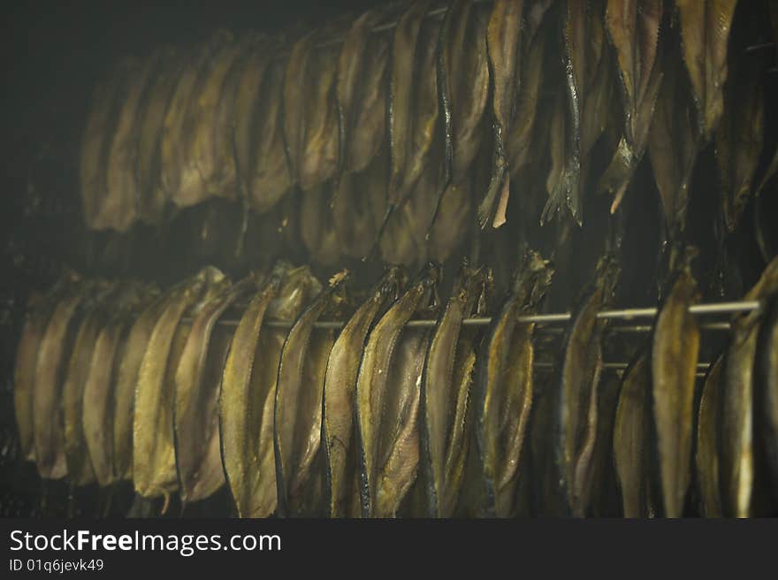 Fish being smoked in a smoke house in Mallaig, Scotland. Fish being smoked in a smoke house in Mallaig, Scotland