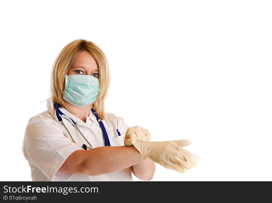 Doctor with respirator adducts her latex gloves. Doctor with respirator adducts her latex gloves