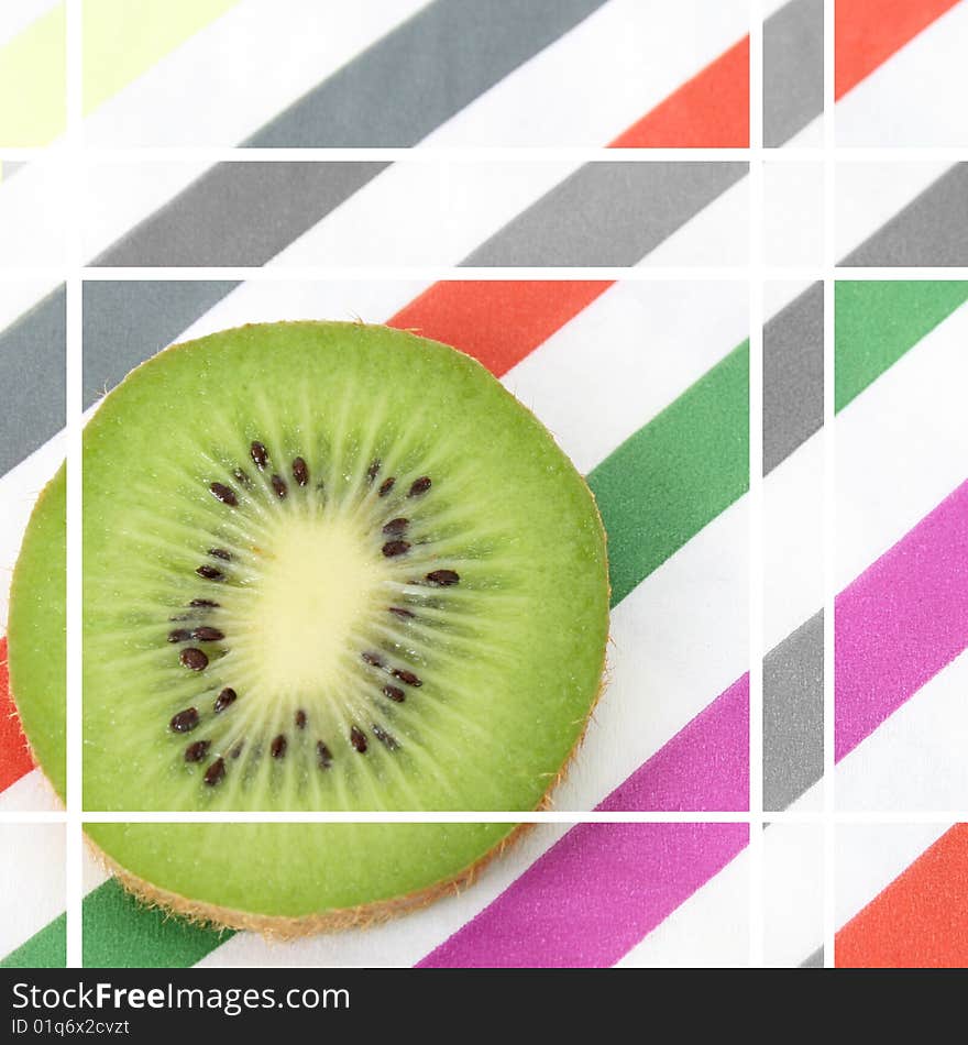 Slice of fresh Kiwi on a striped serviette