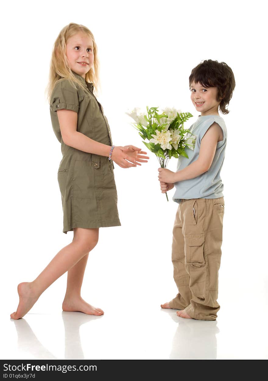 Two (girl and little boy) children with  flowers. Two (girl and little boy) children with  flowers