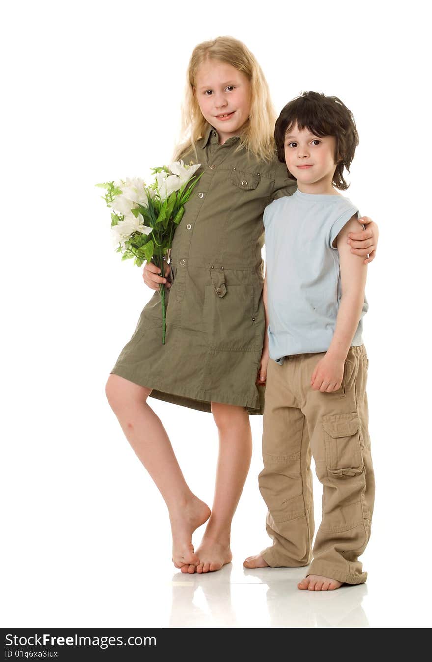 Two (girl and little boy) children with  flowers. Two (girl and little boy) children with  flowers