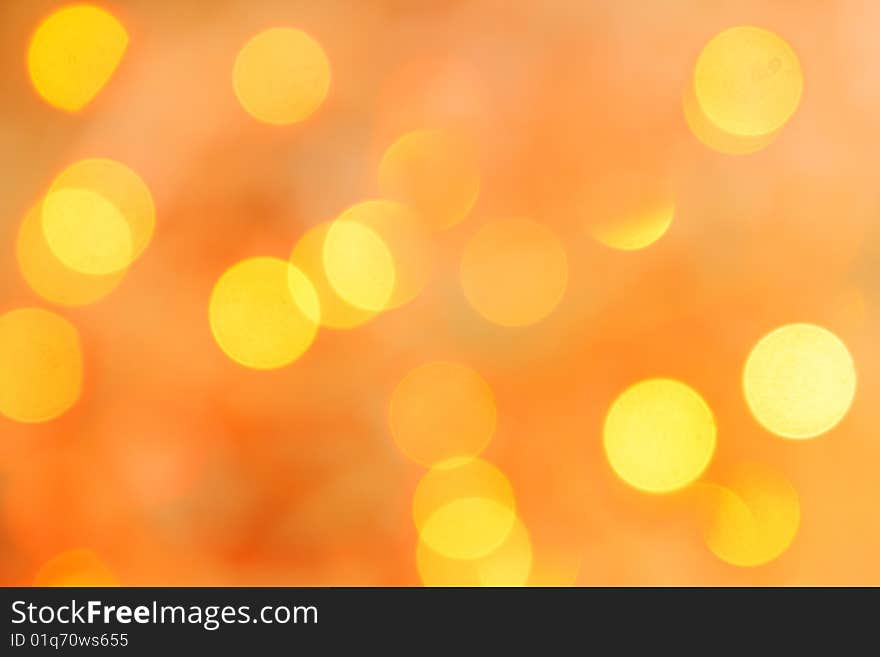 Bright blurred bokeh background of warm tonality. Bright blurred bokeh background of warm tonality