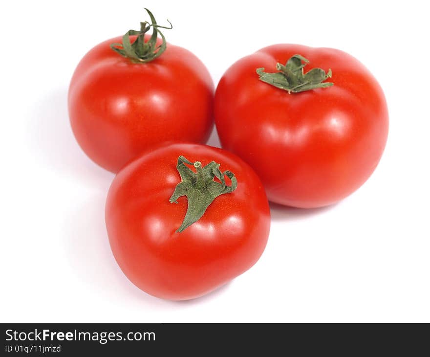 Fresh tomatoes on white background