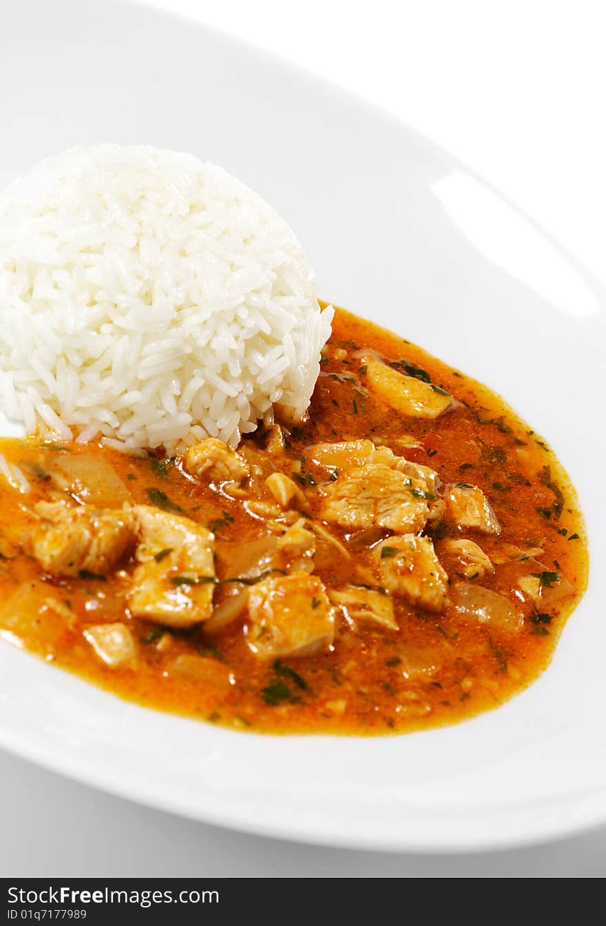 Rice with Chicken Stew Plate. Isolated on White Background