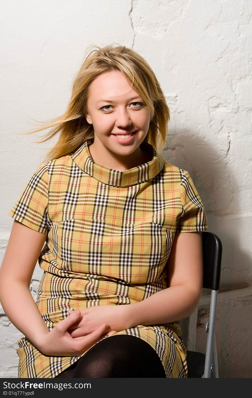 The young charming smiling woman, portrait in studio. The young charming smiling woman, portrait in studio