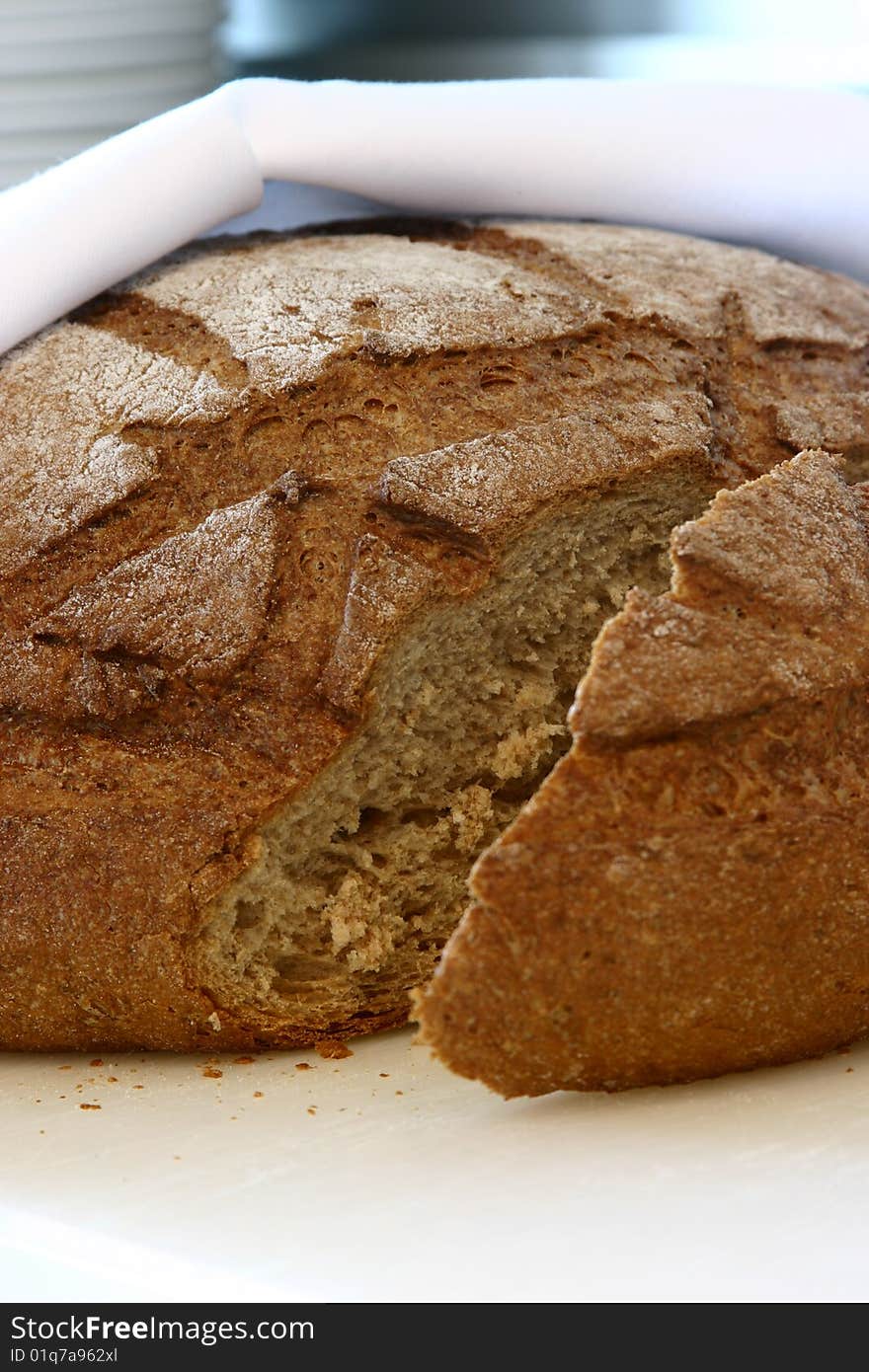 Loaf of brown bread on the table