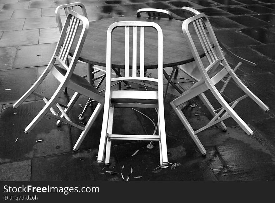 Cafe chairs on a rainy day