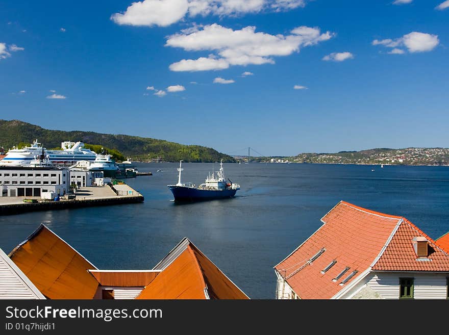 Ship enters the harbor. Bergen, Norway.