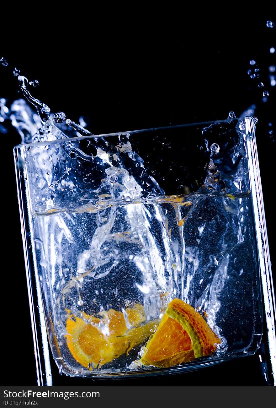 Close up view of the orange  splash in water