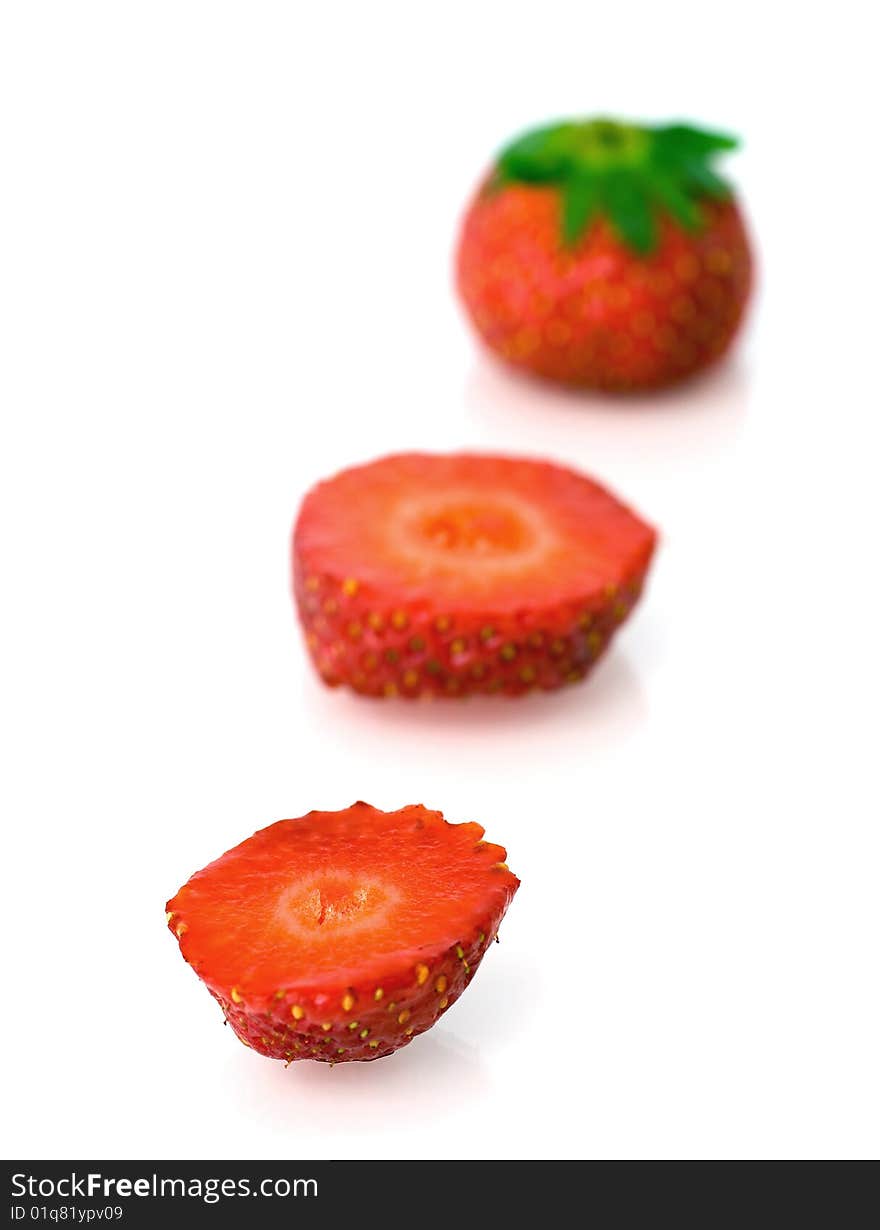 Three part of a strawberry on white background. Three part of a strawberry on white background.