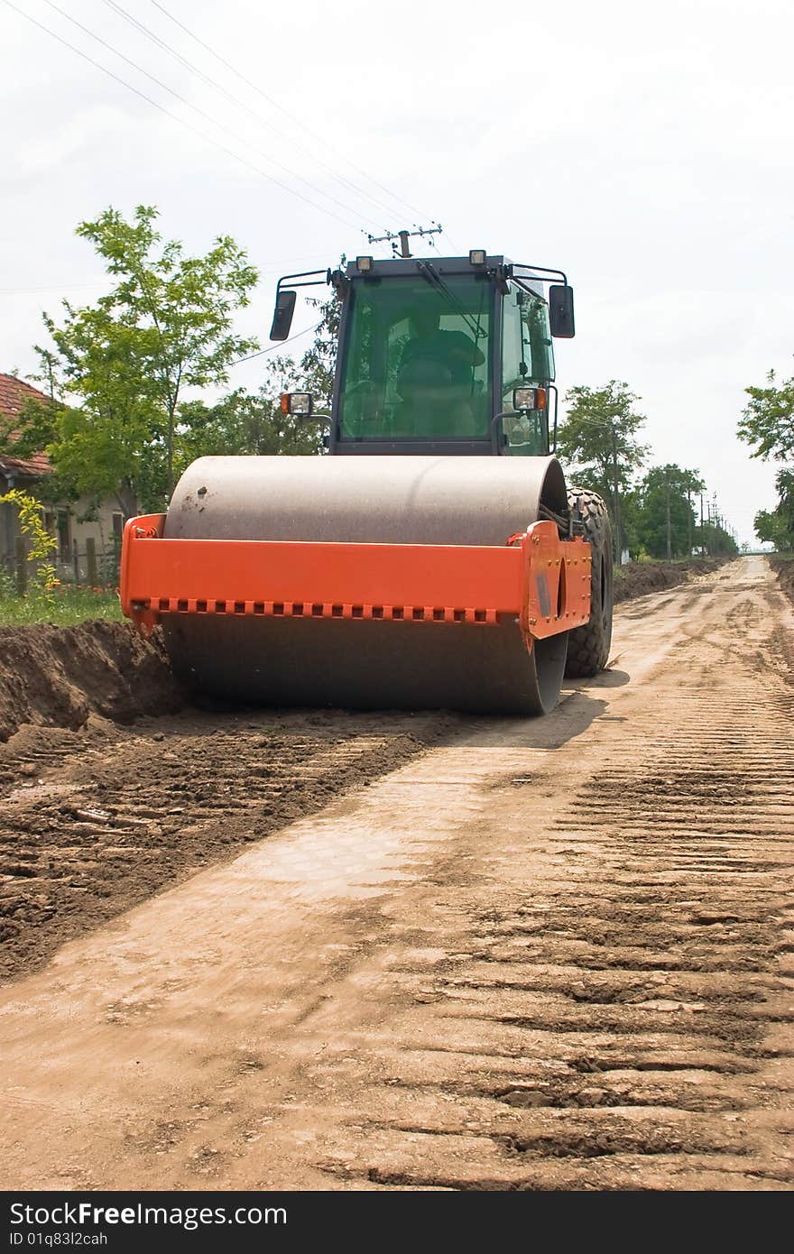 Roller jamming ground for a new street in a village. Roller jamming ground for a new street in a village