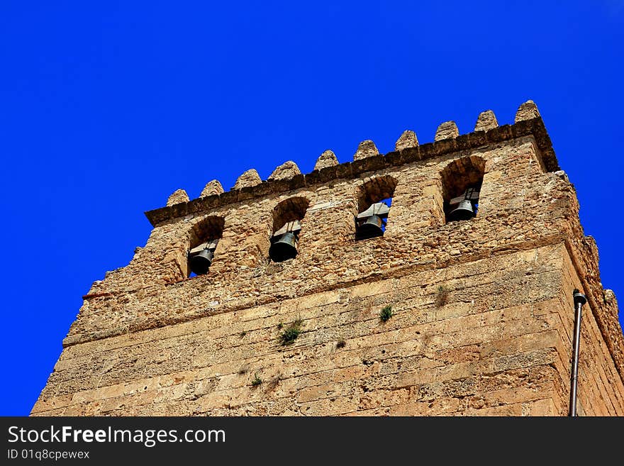 Bell tower on blue sky, Monreale cathedral