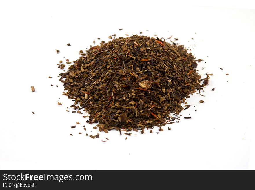 Natural Indian tea with slices of the fruit, isolated