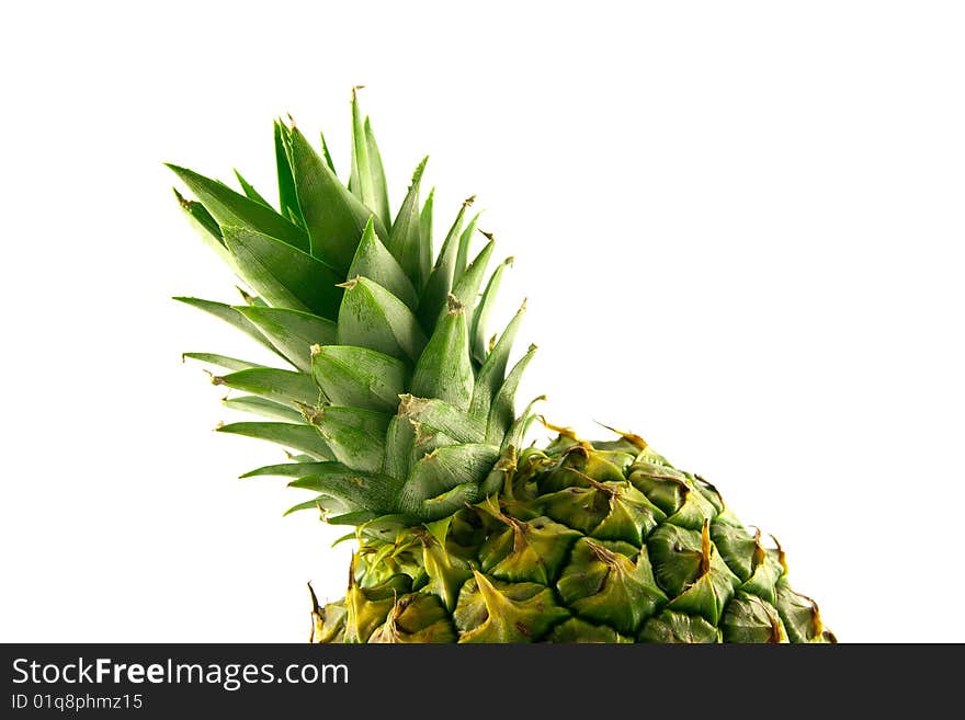 Fresh delicious looking green pineapple fruit on a white background with a clipping path. Fresh delicious looking green pineapple fruit on a white background with a clipping path