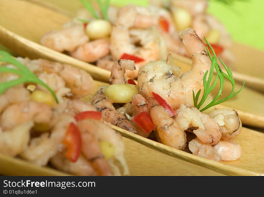 Beautifully presented plate with shrimp appetizers. close up. Beautifully presented plate with shrimp appetizers. close up.