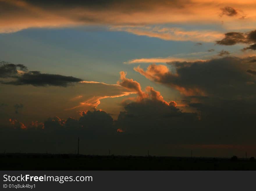 Countryside sunset over a field