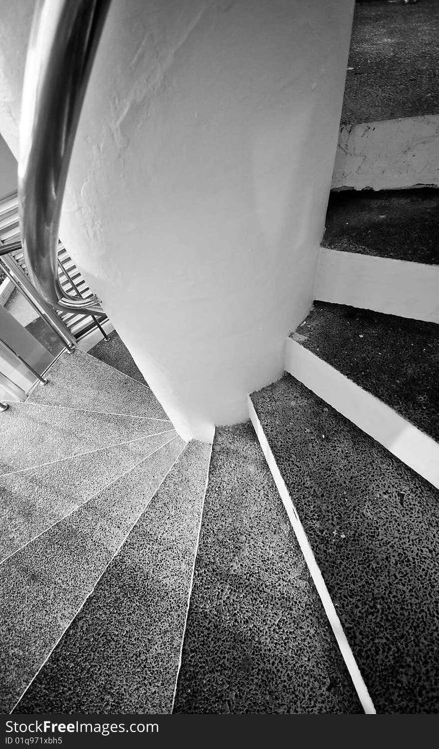 Steps of a spiral staircase in black and white