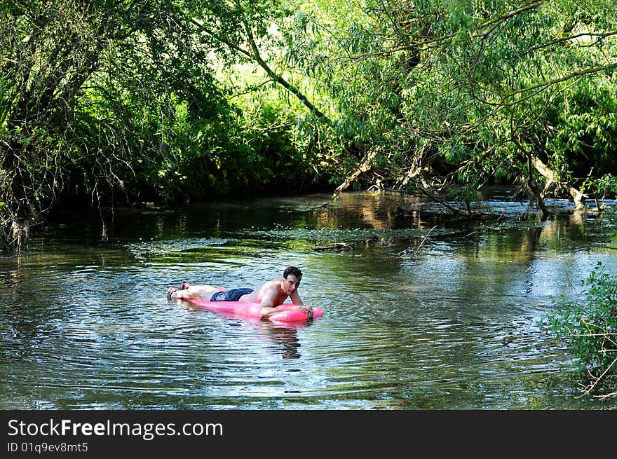 Man floating on the river