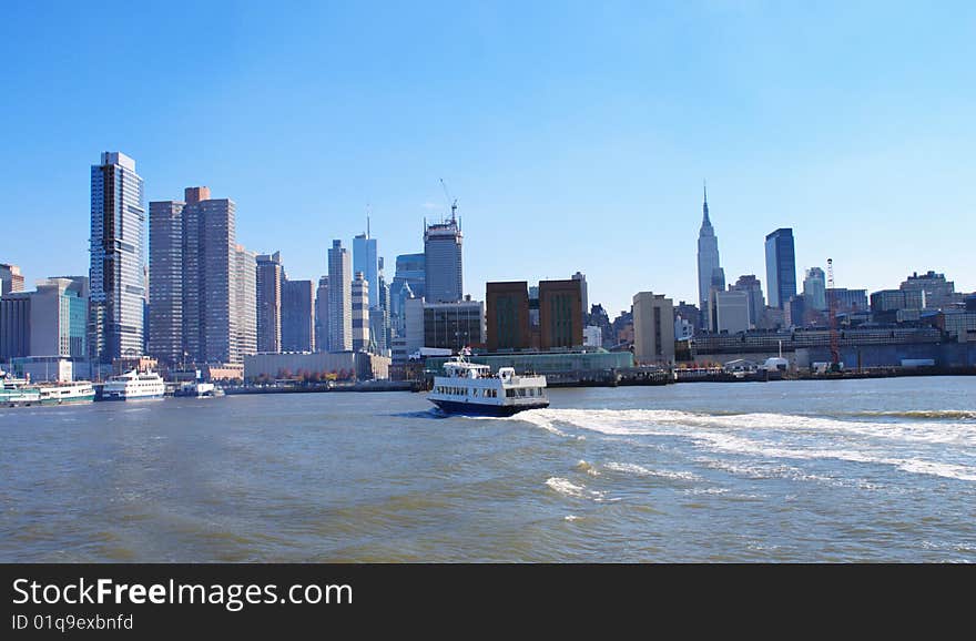 Boat cruising with Manhattan at the background