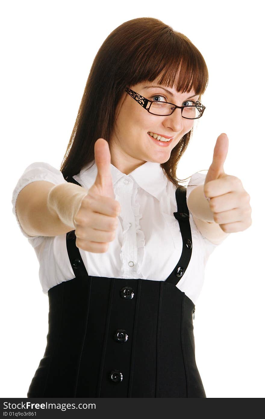 Young businesswoman showing 'thumbs up' sign. Young businesswoman showing 'thumbs up' sign