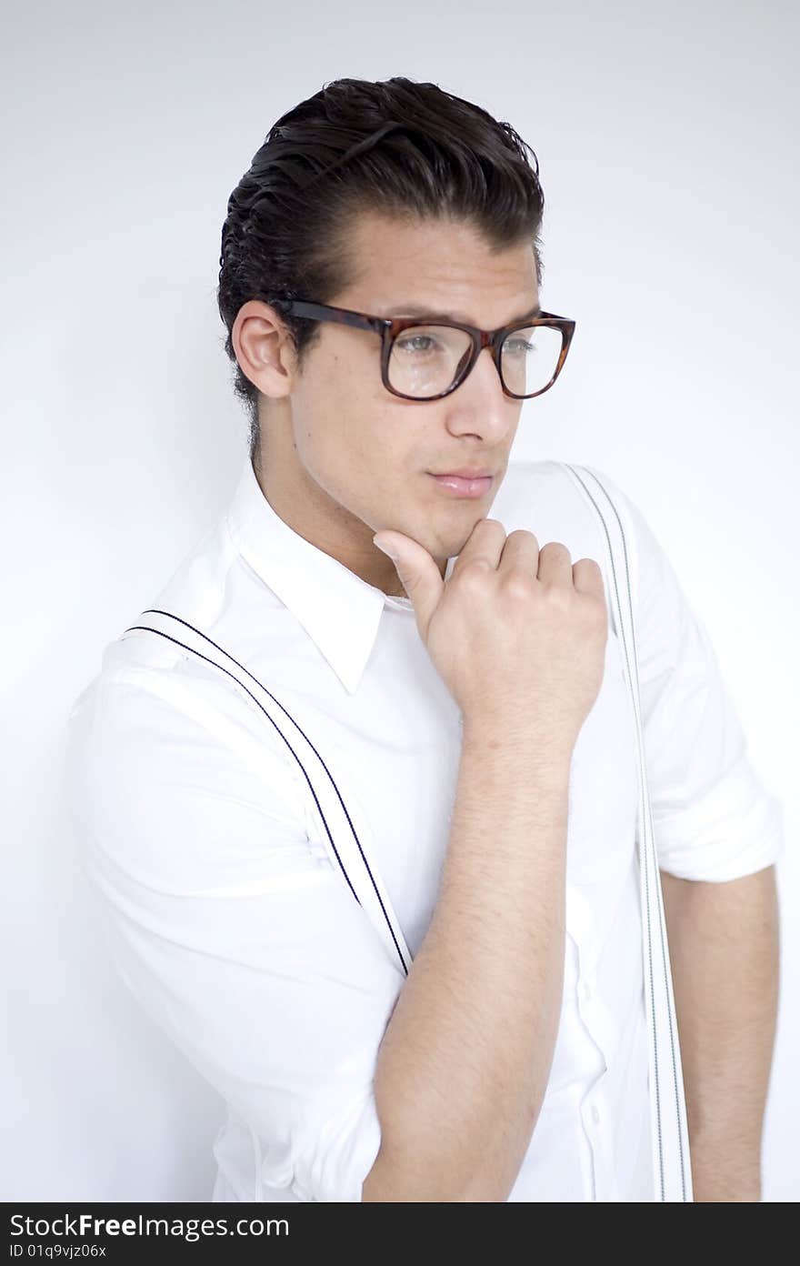 Stylish man wears white shirt and braces. Stylish man wears white shirt and braces