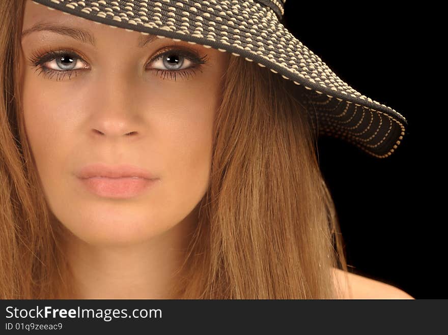 Beautiful image of a Model with a Hat On Black. Beautiful image of a Model with a Hat On Black