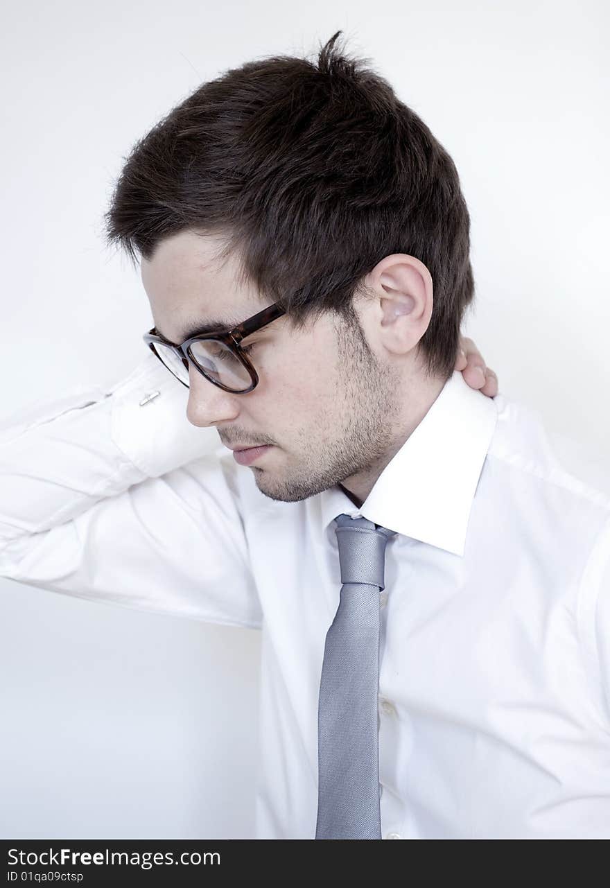 Young stylish man wears glasses and white shirt. Young stylish man wears glasses and white shirt