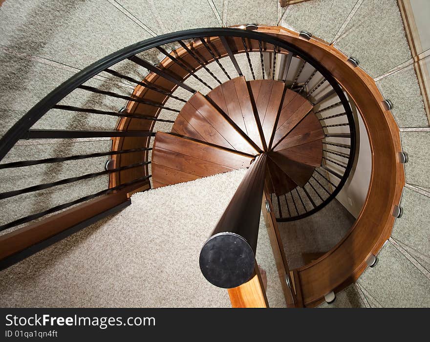 Wooden spiral staircase looking down