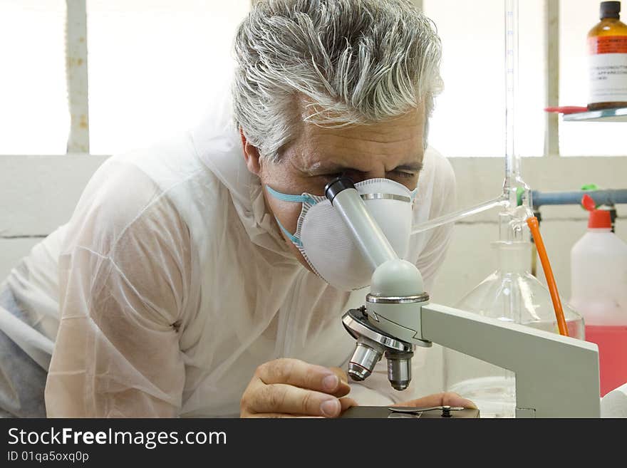 A researcher at work in his laboratory. A researcher at work in his laboratory