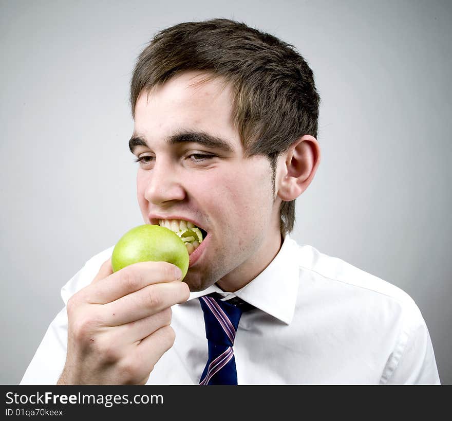 Man eats apple