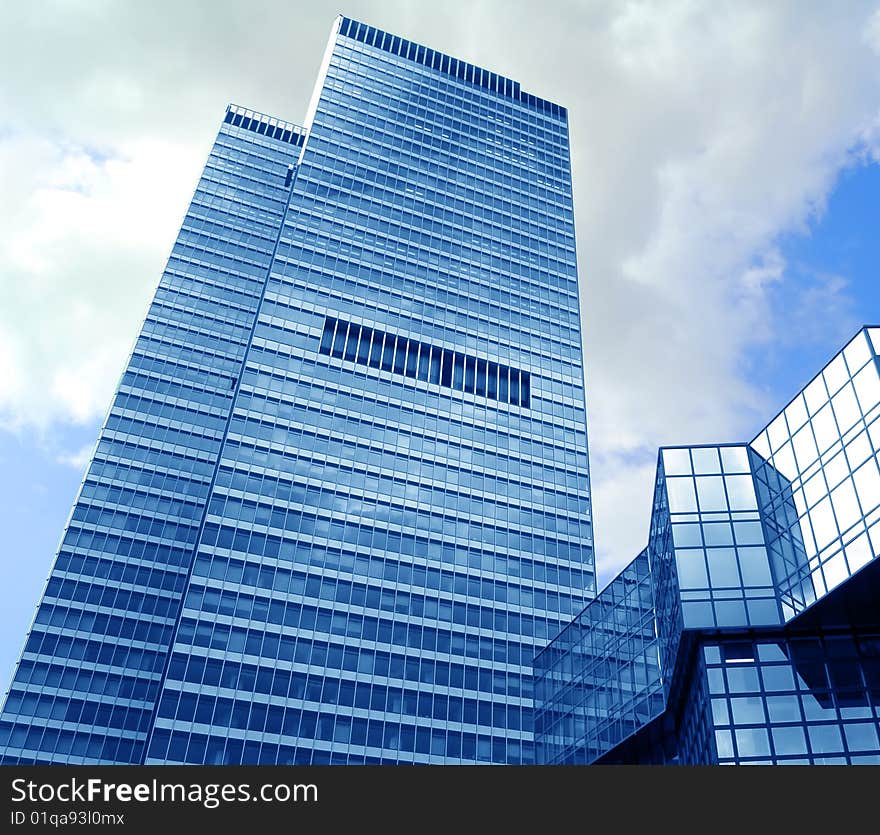 High modern skyscraper on a background of the blue sky