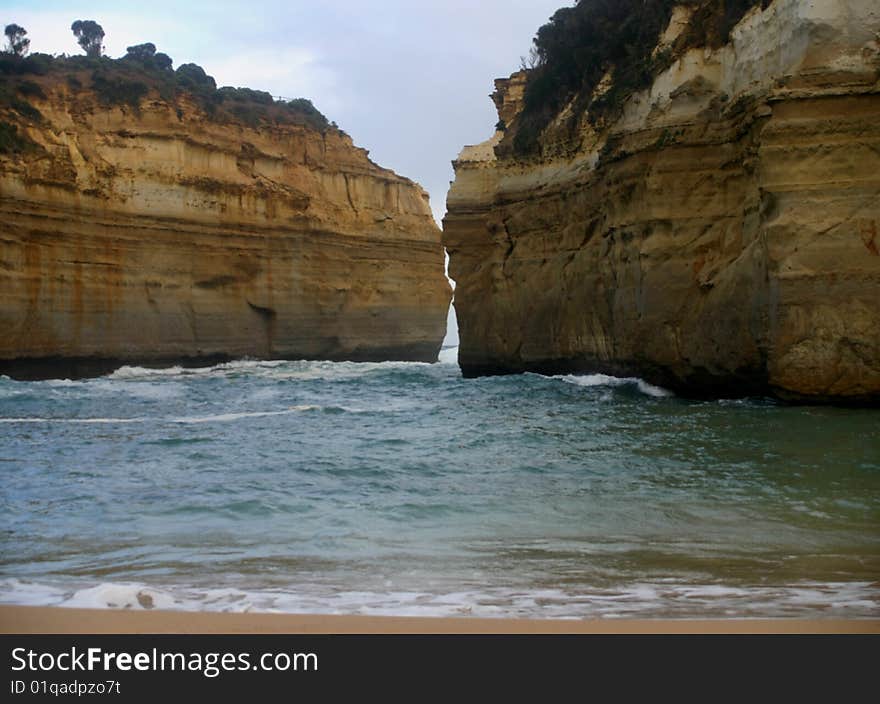 Loch Ard Gorge is one of the places to visit in the Port Campbell area of Victoria, Australia. In summertime you absolutely have to pack a picnic basket and spend the day there. It really is one of those sensational spots where you can relax, have a swim or muck about on the beach.

To the east of the gorge are the famous limestone towers of The Twelve Apostles that stand up to 45 metres from the pounding waves of the Great Southern Ocean. 

These magnificent structures are formed over thousands of years as the churning seas undermine the soft limestone around them and when that collapses leaves the formation standing out from the cliffs.