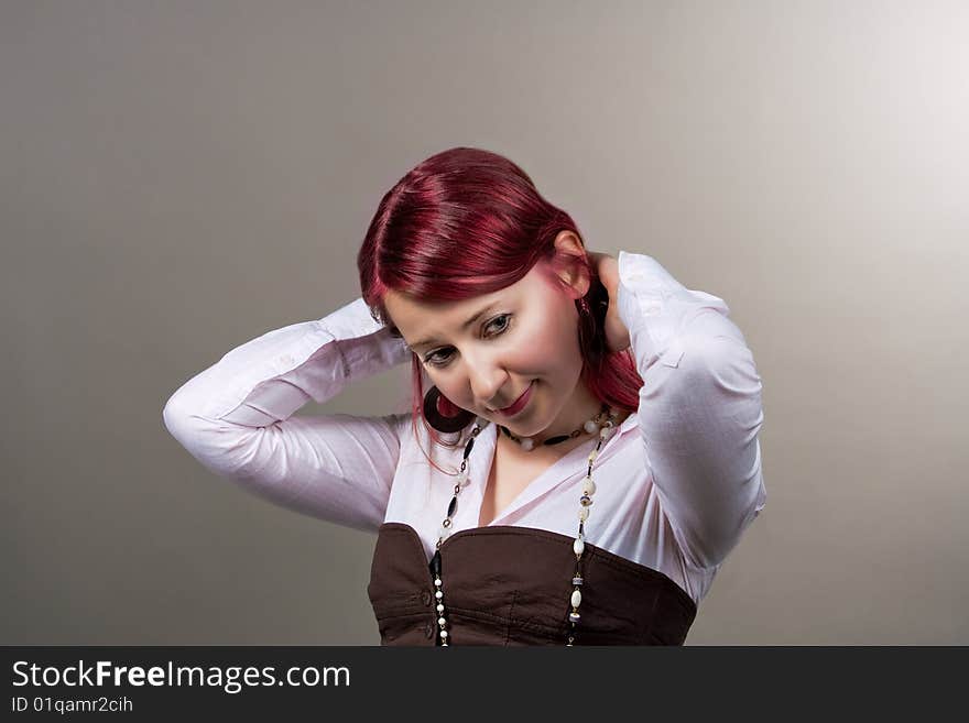 Red haired girl separated over grey