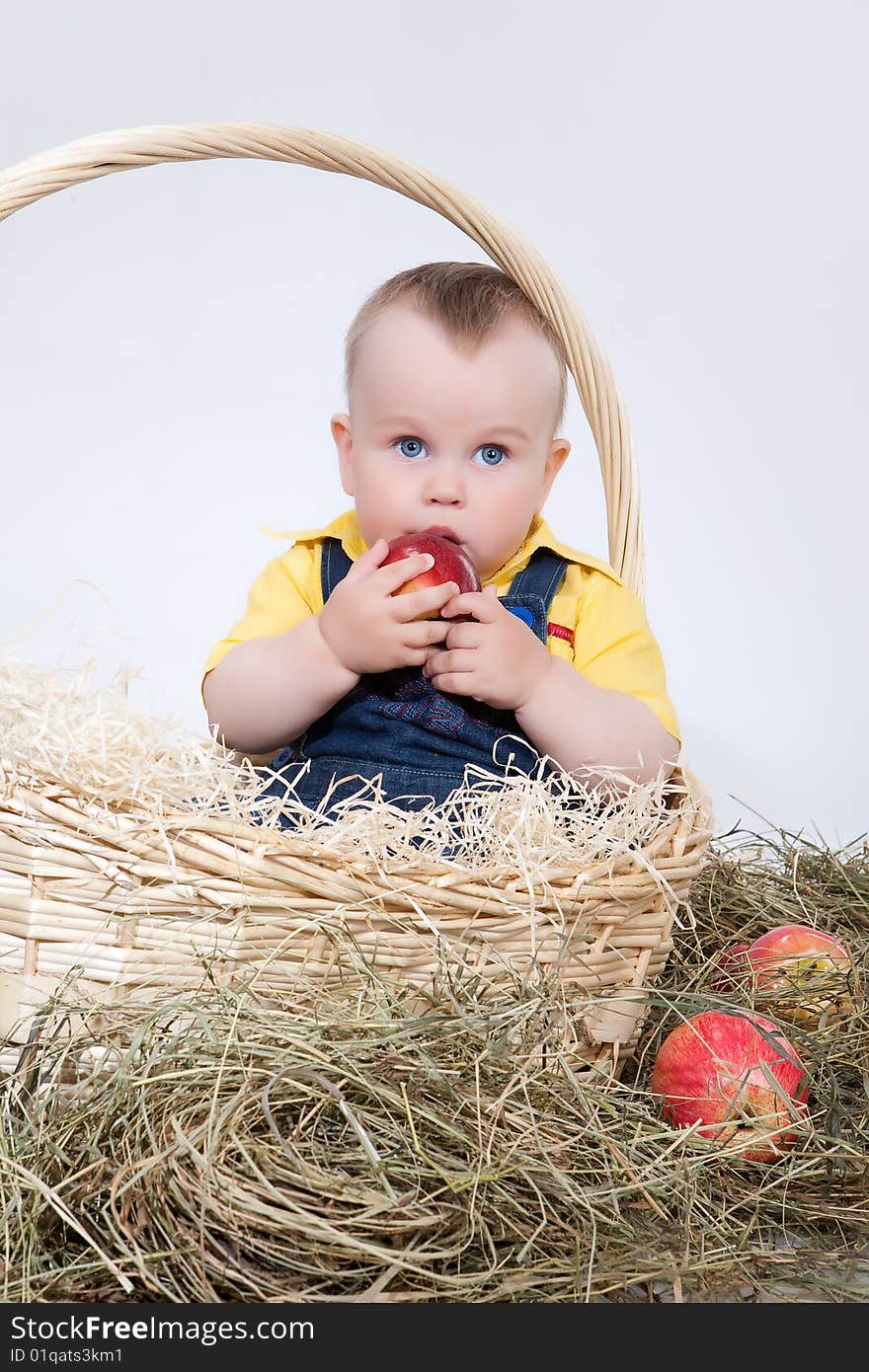 Little child in wicker basket. Little child in wicker basket