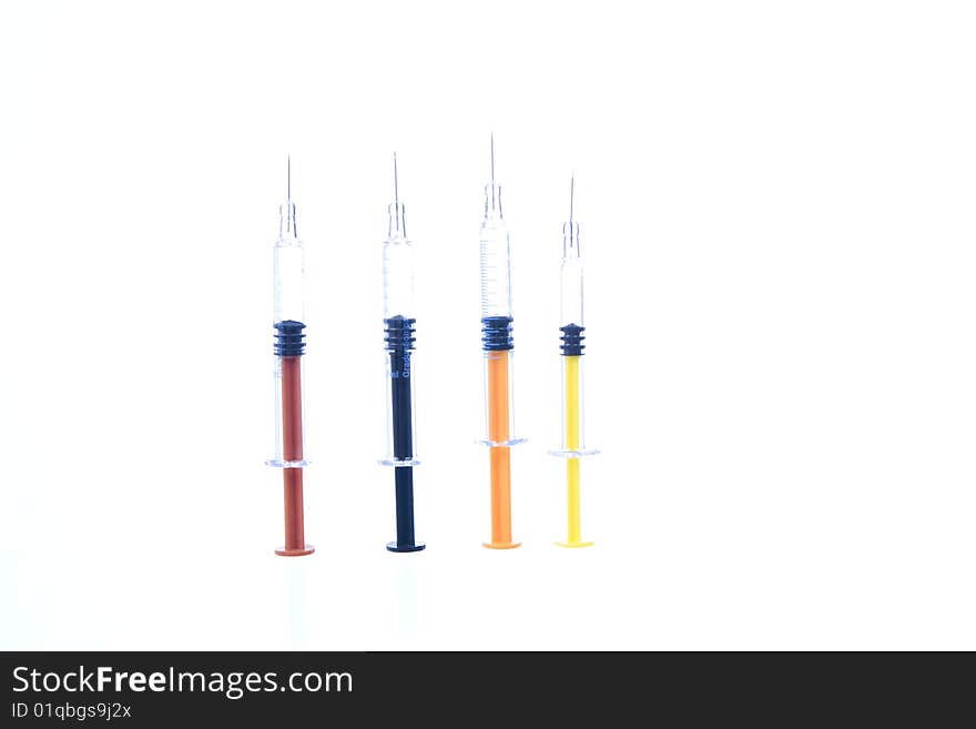 Color syringe on white  background